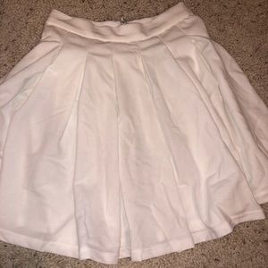 White pleated tennis skirt